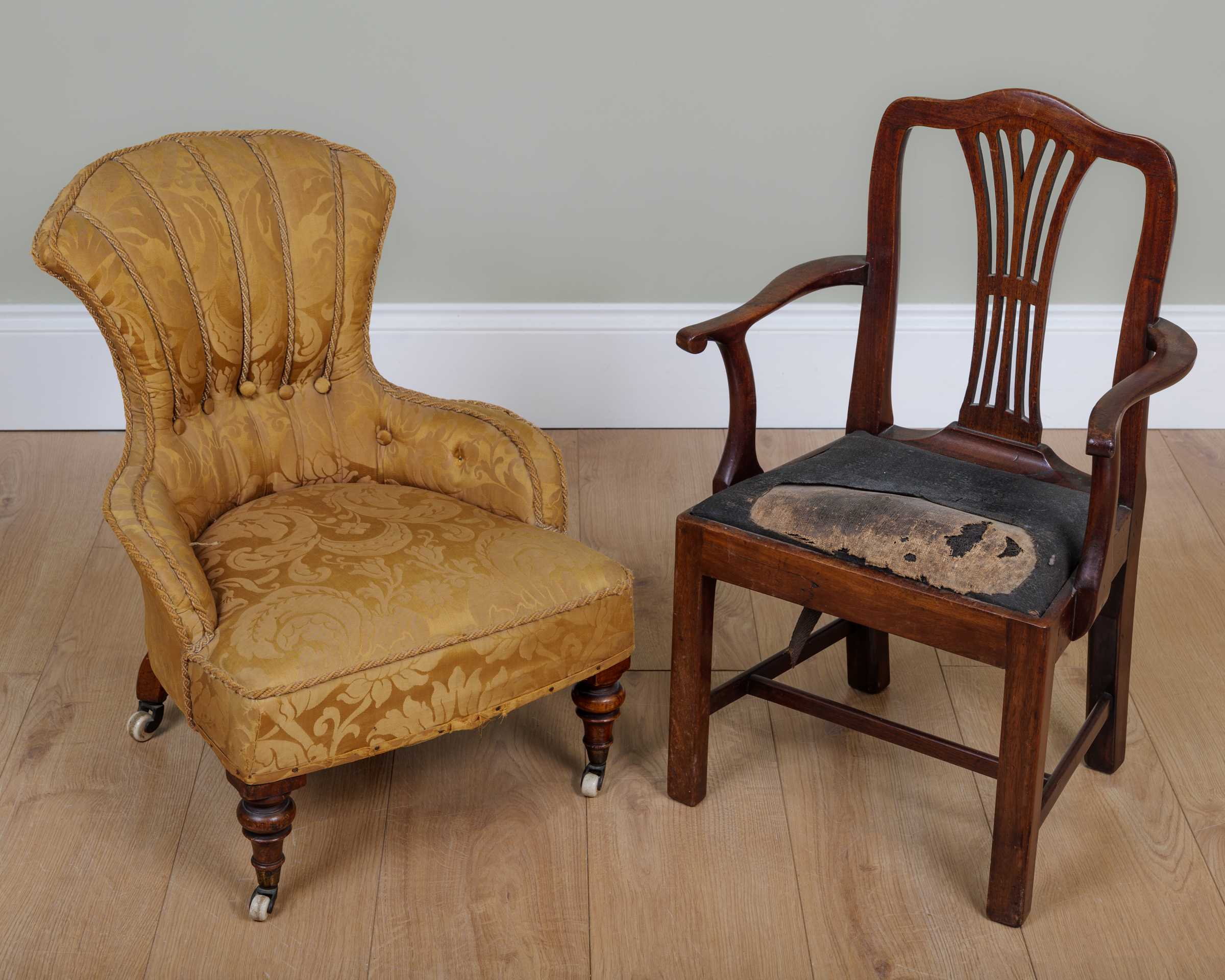 Appraisal: An early th century mahogany child's elbow chair with pierced