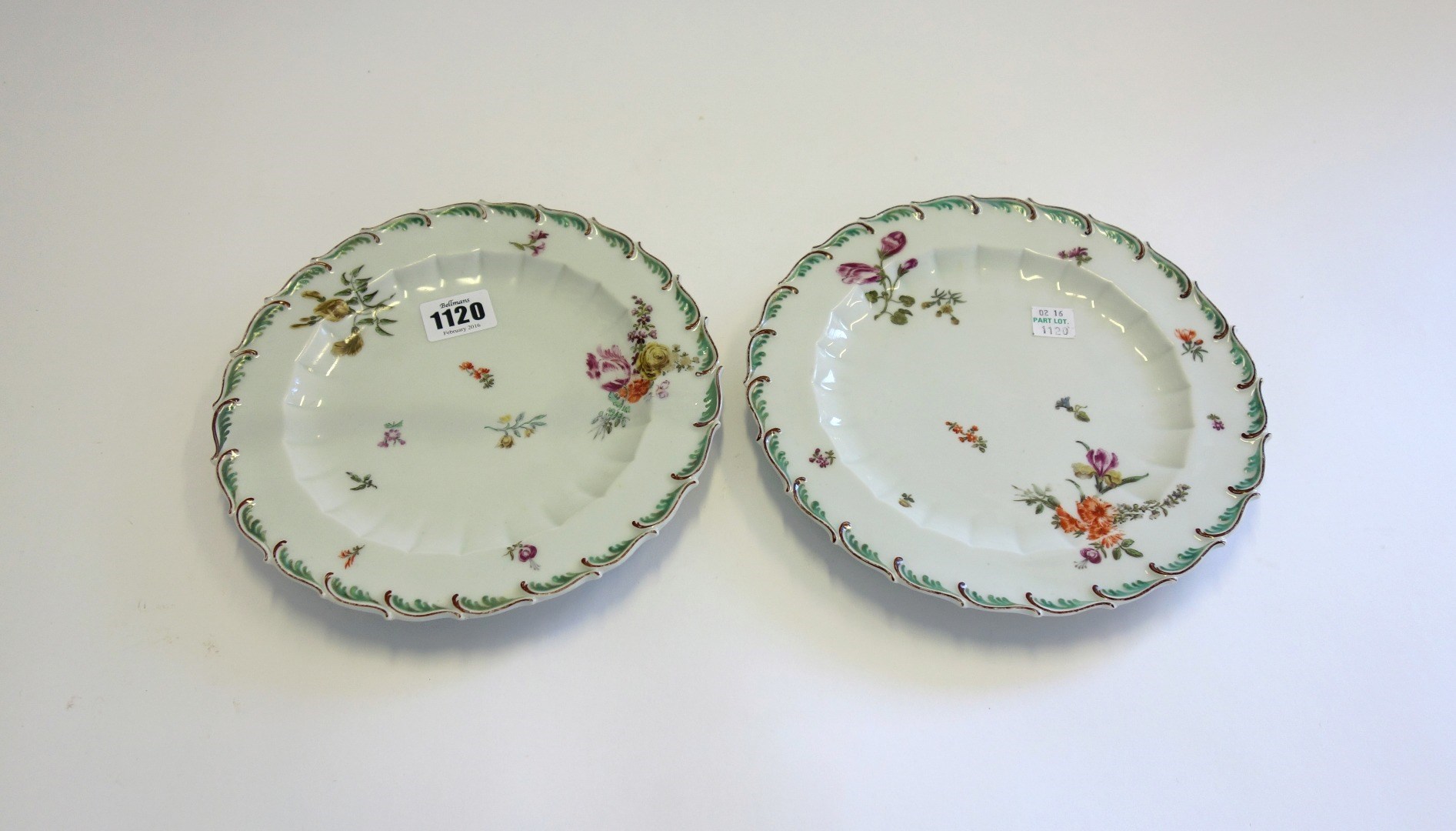 Appraisal: A pair of Chelsea plates circa each painted with scattered