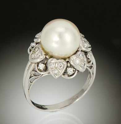 Appraisal: A Ladies' Platinum Diamond and Pearl Ring Platinum ring with