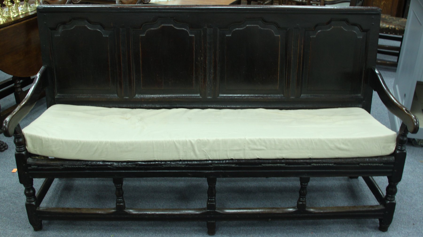 Appraisal: A mid th Century provincial oak settle the quadruple fielded