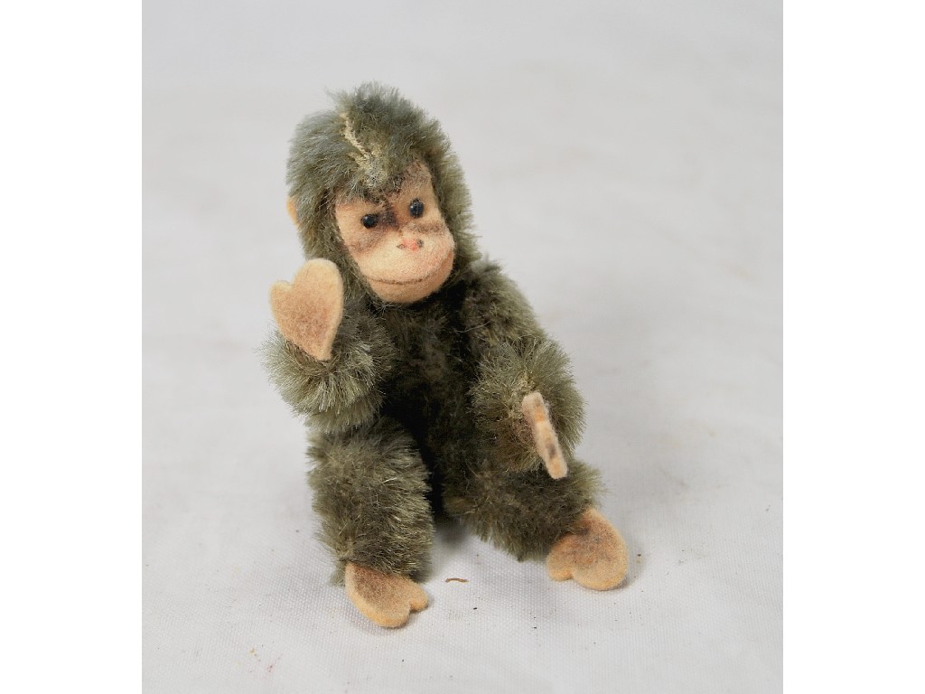 Appraisal: A small Steiff brown plush monkey cm