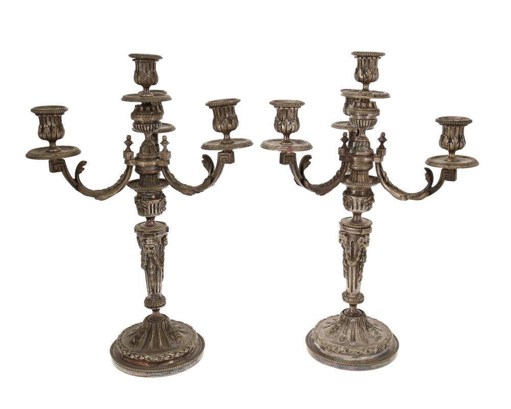 Appraisal: A PAIR OF FRENCH SILVER-PLATED CONVERTIBLE CANDELABRAA pair of French