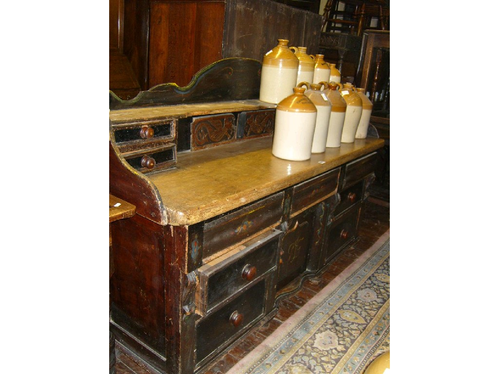 Appraisal: A Victorian Lancashire dresser the painted base fitted with an