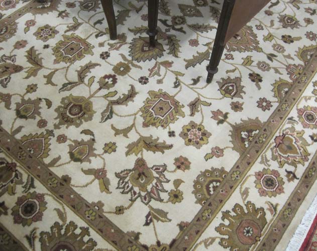 Appraisal: HAND KNOTTED ORIENTAL CARPET Indo-Persian having an overall floral decorated