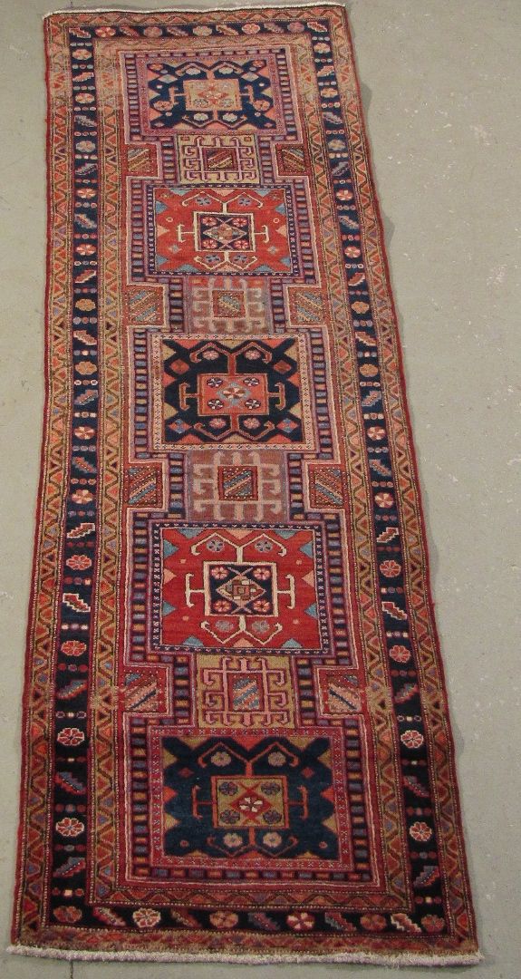 Appraisal: ORIENTAL RUG HERIZ RUNNER ' x ' Five rectangular medallions