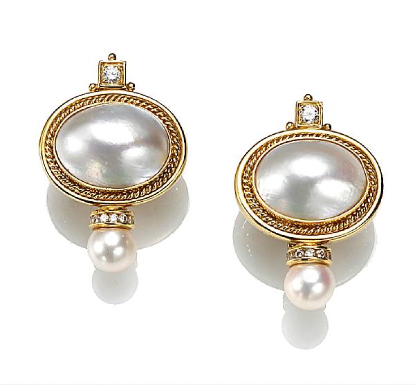 Appraisal: A pair of mab cultured pearl and diamond earclips mab