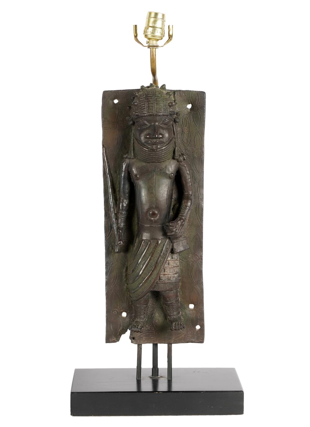 Appraisal: CARVED WOOD PLAQUE OF A MANmounted as a table lamp