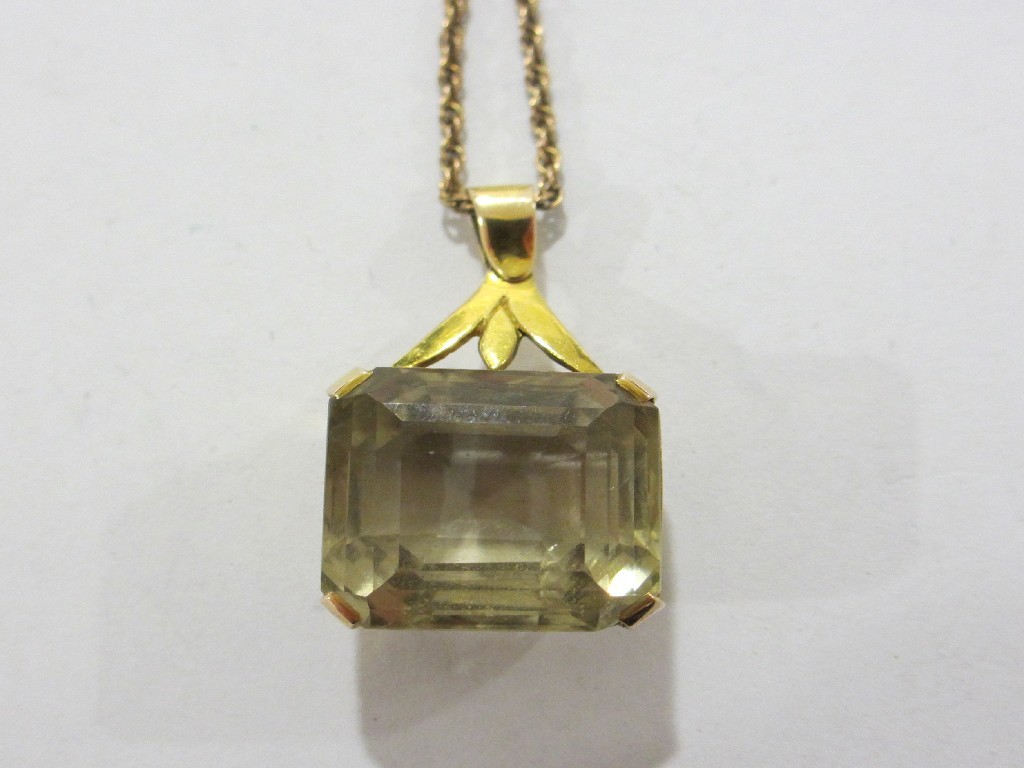 Appraisal: Cushion cut topaz in gold mount and with gold neckchain