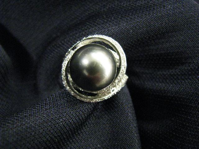 Appraisal: South Sea Black Pearl Diamond Ring fine mm pearl surrounded