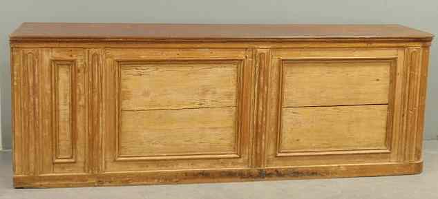 Appraisal: Country pine store counter c with a walnut top paneled