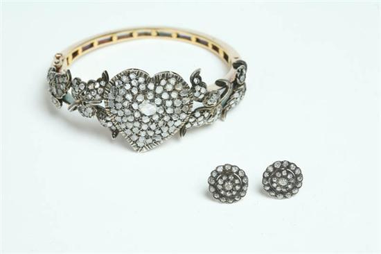 Appraisal: BANGLE AND EARRINGS Victorian style bracelet with center heart surrounded