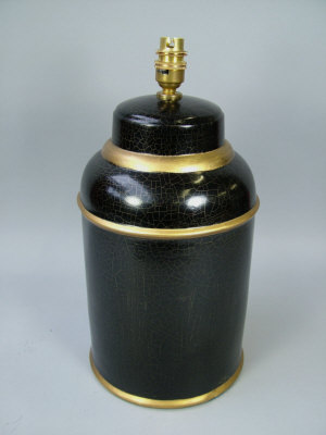 Appraisal: A simulated tole tea canister lamp base decorated in black