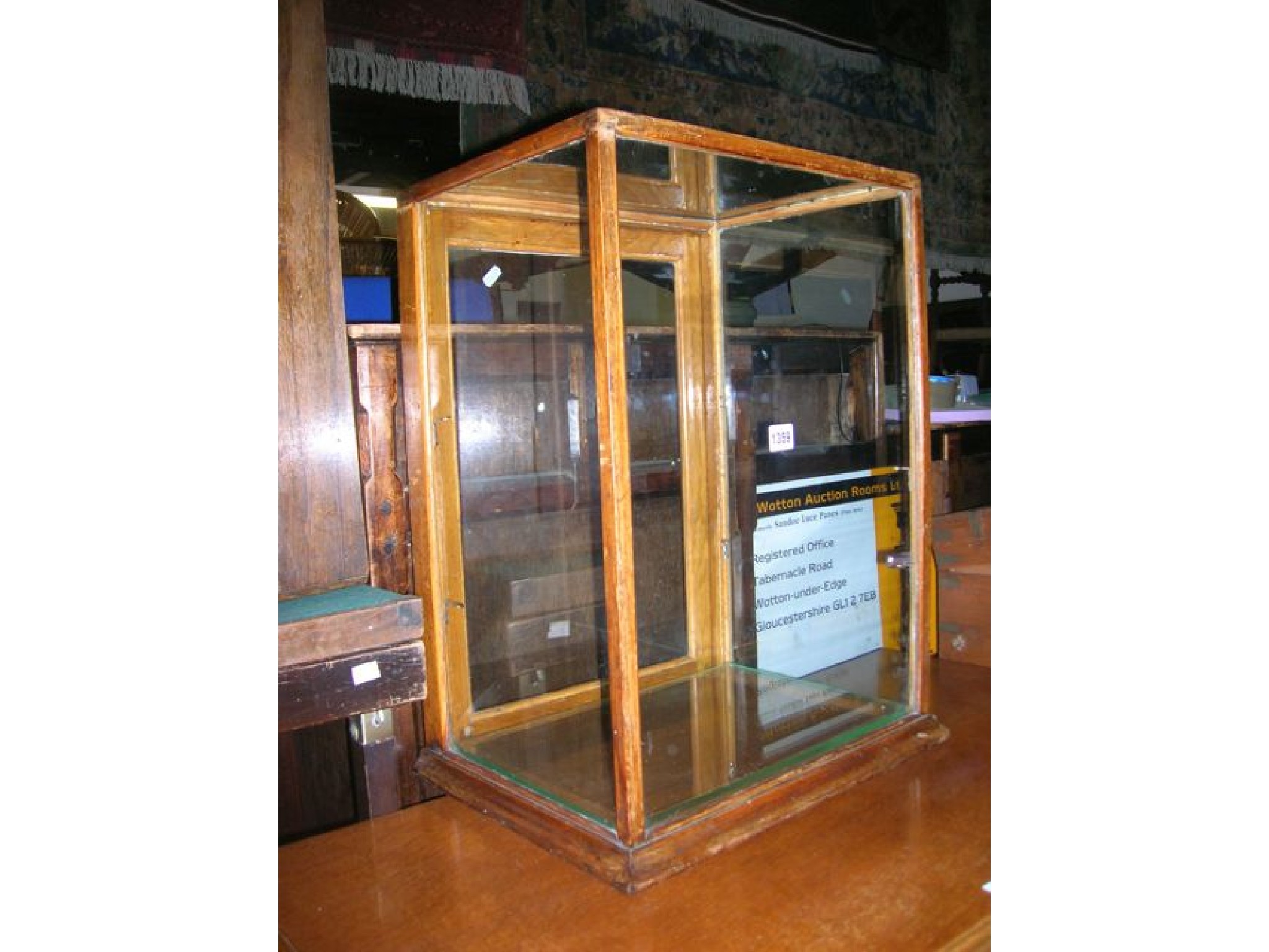 Appraisal: A vintage vertical shop counter top display case of square