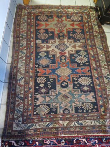 Appraisal: Kazak Persian Handmade Rug semi-antique overall geometrics flat weave '