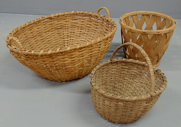 Appraisal: Large oval splintwood basket x and two other baskets