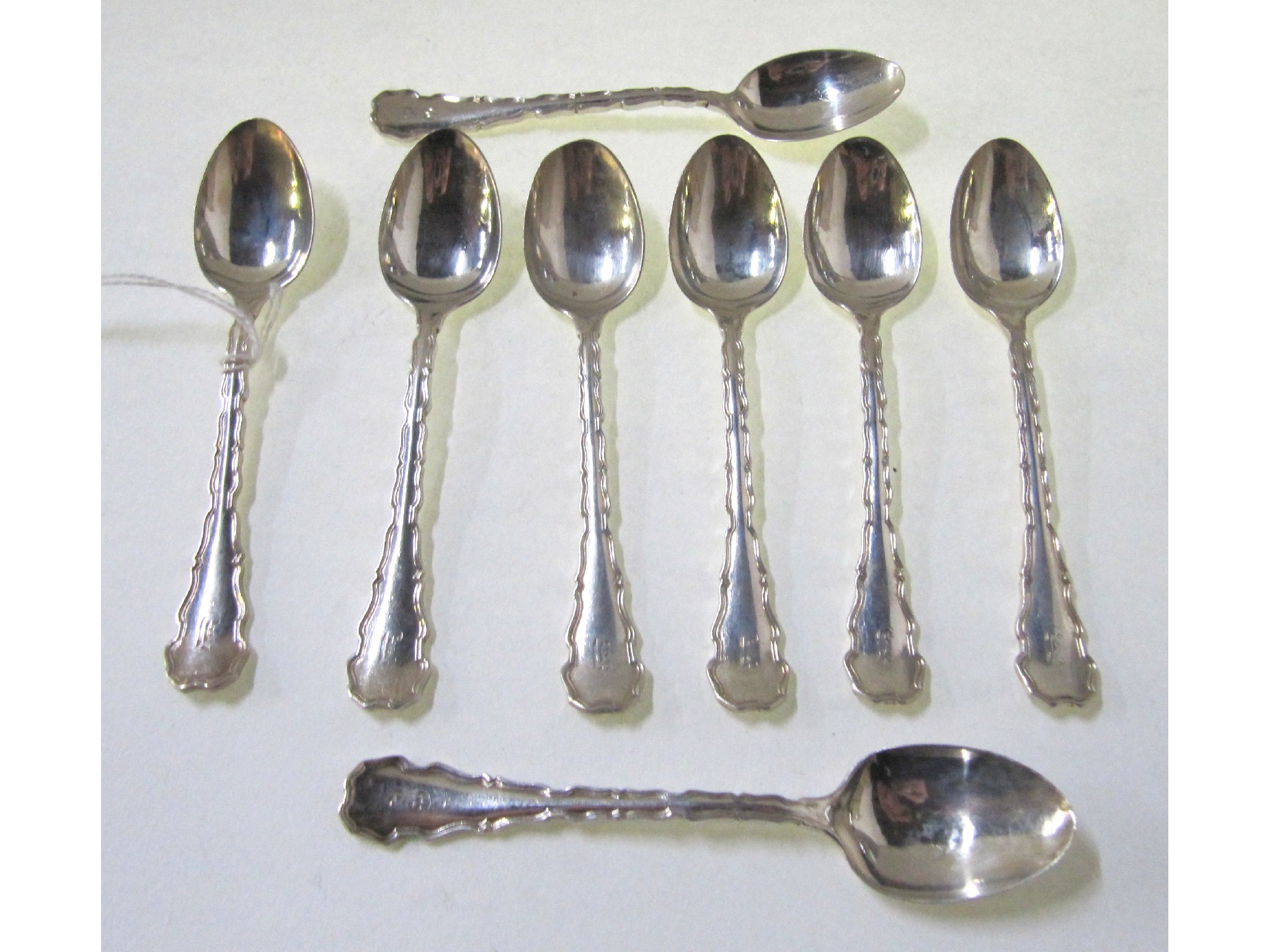 Appraisal: A set of eight silver coffee spoons Sheffield