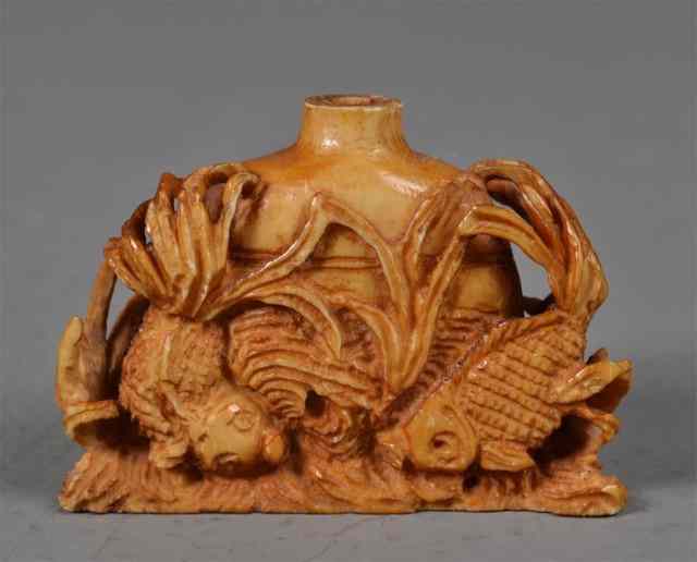 Appraisal: Chinese Ming Carved Ivory Snuff bottleFinely carved to depict fish