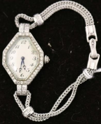 Appraisal: PLATINUM AND DIAMOND LADY'S WATCH BY C H MEYLANBRASSUS SWISS