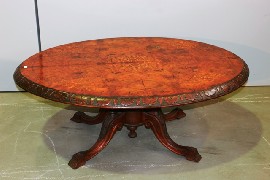 Appraisal: A Victorian burr walnut and inlaid loo table