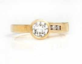 Appraisal: An ct gold round brilliant cut diamond ring with matching