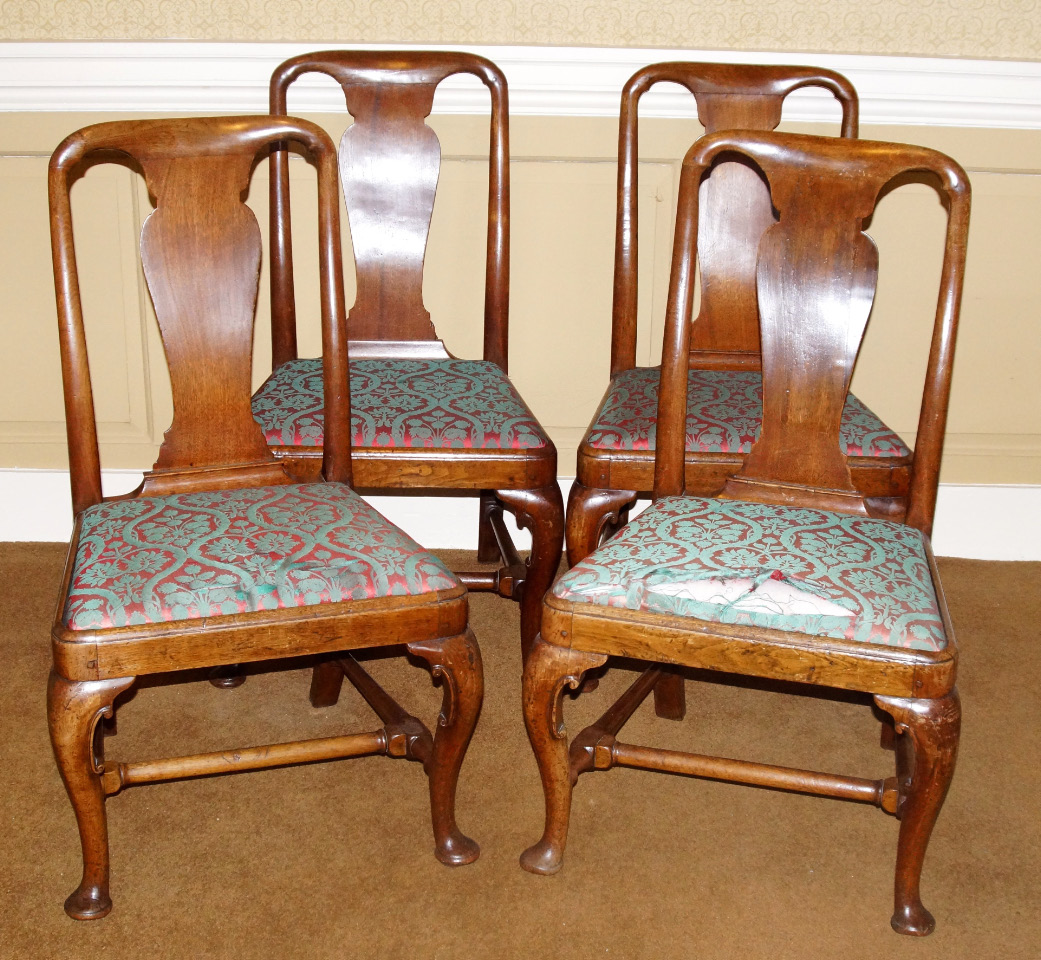 Appraisal: A set of four thC walnut dining chairs each with