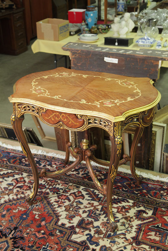 Appraisal: SIDE TABLE Ornate table with gilt accents and inlay on