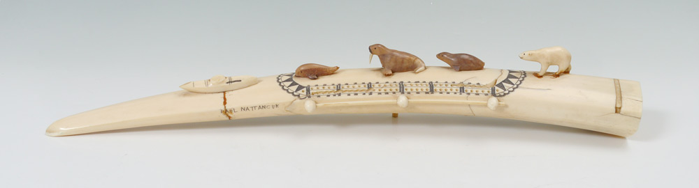 Appraisal: PAUL NATTANGUK WALRUS TUSK CRIBBAGE BOARD An exceedingly large tusk