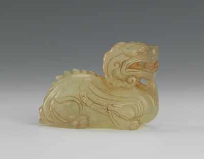 Appraisal: Chinese Carved Jade Recumbent Beast Translucent yellow green jade nicely