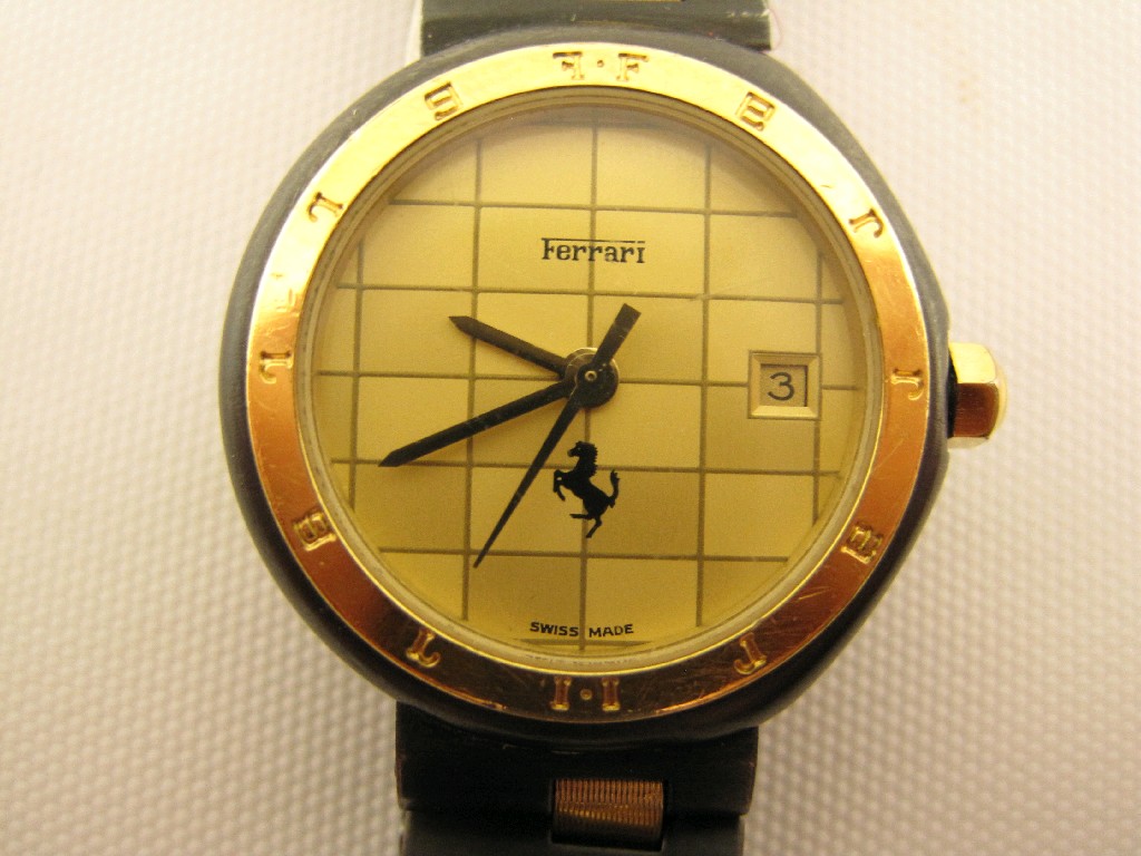 Appraisal: A Ferrari Lady's quartz Wristwatch the circular chequered dial with