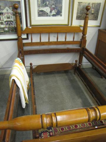 Appraisal: Cherry Cannonball rope bed with trundle converted to accept modern