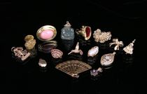 Appraisal: A Group of Charms Lot includes charms pendants a tiny