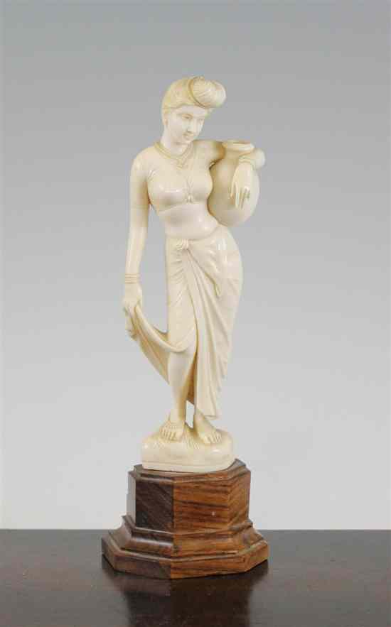 Appraisal: An Indian ivory figure of a maiden first half th