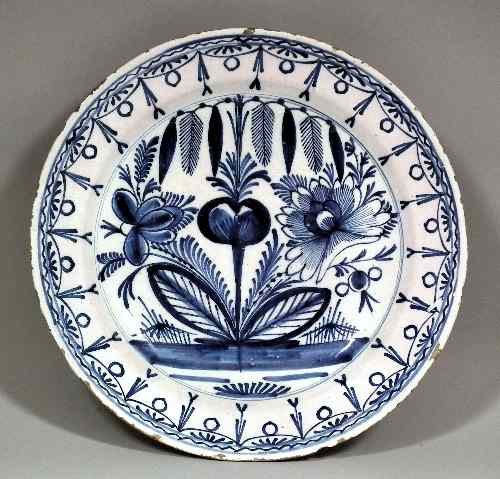 Appraisal: A mid late th Century Dutch Delft charger painted in