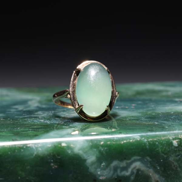 Appraisal: k yellow gold ring set with translucent jadeite cabochon the