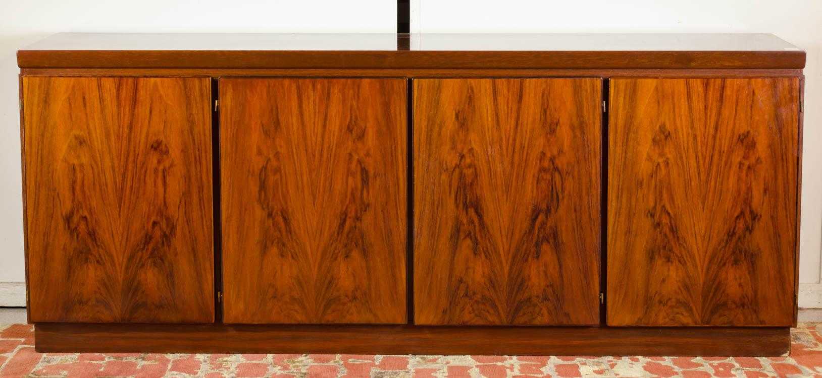 Appraisal: SWEDISH MODERN ROSEWOOD CREDENZA four cabinet doors across the front