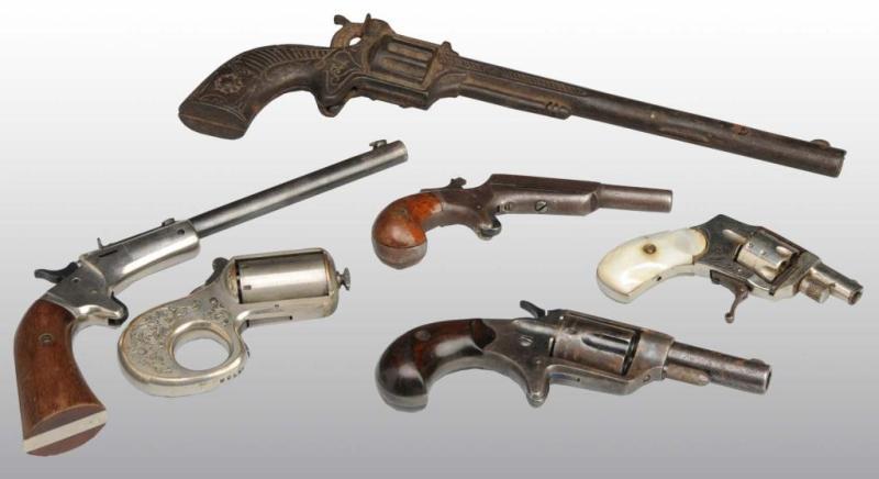 Appraisal: Lot of Antique Hand Guns Description Includes one cast iron