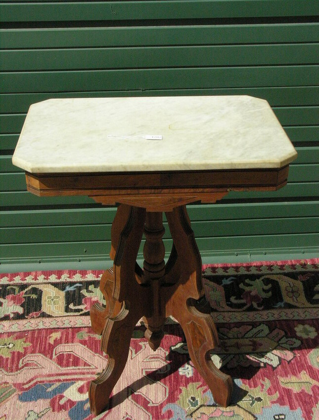 Appraisal: VICTORIAN WALNUT EASTLAKE MARBLE PARLOR TABLE Size by by