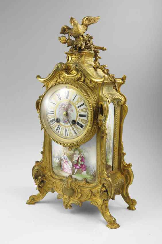 Appraisal: FRENCH GILT METAL AND PORCELAIN MANTLE CLOCK Gilt metal case