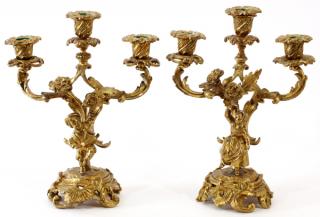 Appraisal: FRENCH BRONZE THREE-LIGHT FIGURAL CANDELABRA PAIR H L A pair