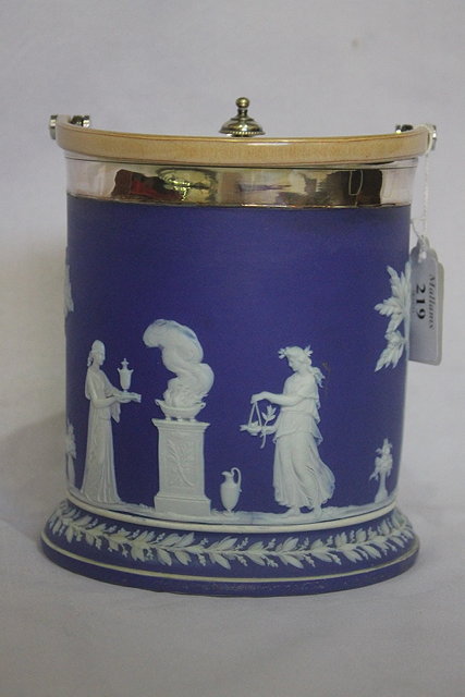 Appraisal: A WEDGWOOD BLUE JASPERWARE CYLINDRICAL BISCUIT BARREL with silver plated