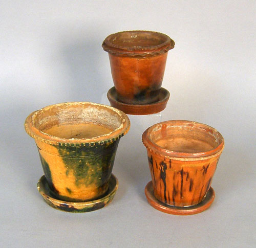 Appraisal: Three redware flower pots th c h h and h