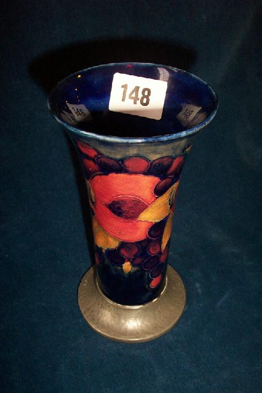 Appraisal: A Moorcroft blue ground vase of cylindrical form with flared