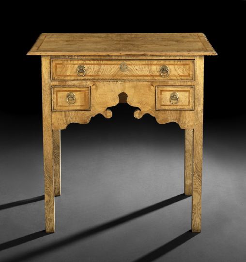 Appraisal: George III-Style Elm Lowboy the rectangular top banded and quarter