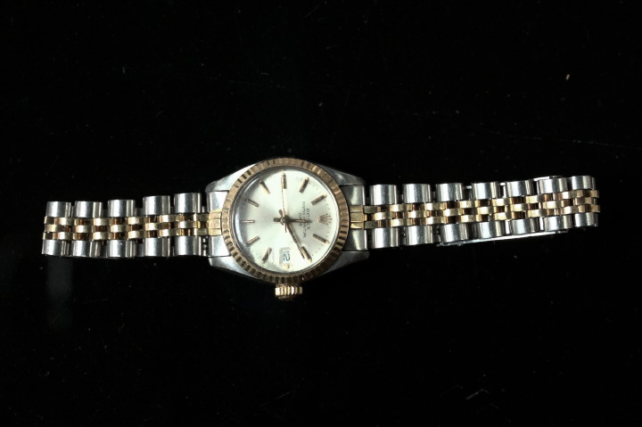 Appraisal: Lady's Stainless Steel and Fourteen-Karat Yellow Gold Rolex Date Wristwatch