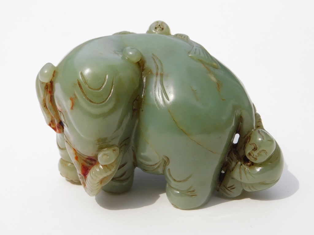 Appraisal: CHINESE QING DYNASTY CARVED JADE ELEPHANT China Qing DynastyDepicts an