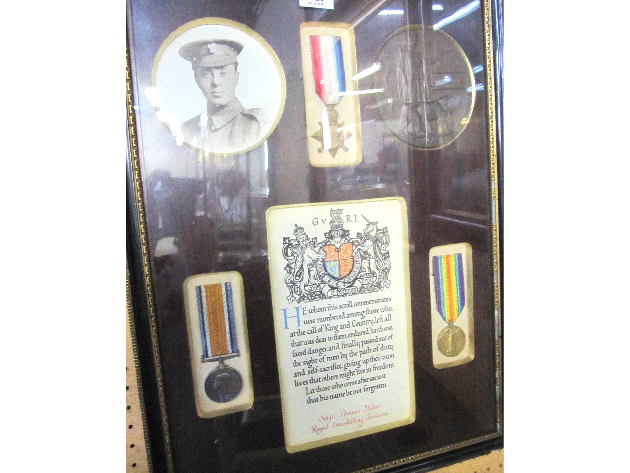 Appraisal: A mounted and framed WWI group of three to Sgt