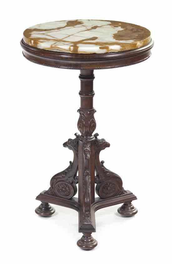 Appraisal: A Continental Mahogany Occasional Table having a circular onyx top