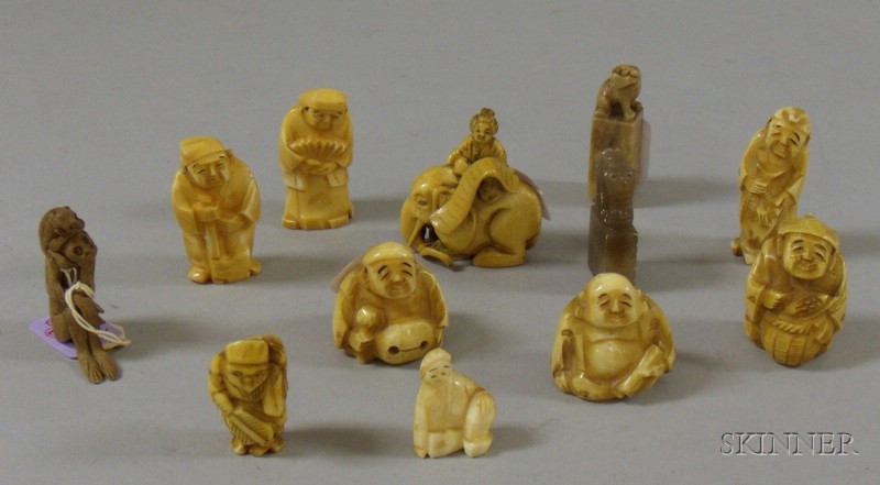 Appraisal: Nine Assorted Figural Netsuke Two Hardstone Seals and a Pottery