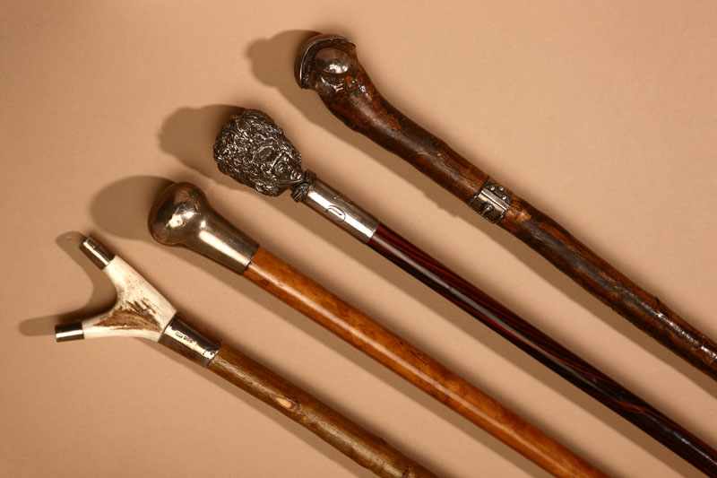 Appraisal: A group of American and English sterling silver-mounted walking sticks