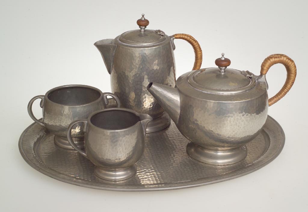 Appraisal: LIBERTY CO TUDRIC PEWTER TEA SERVICE c comprising teapot hot